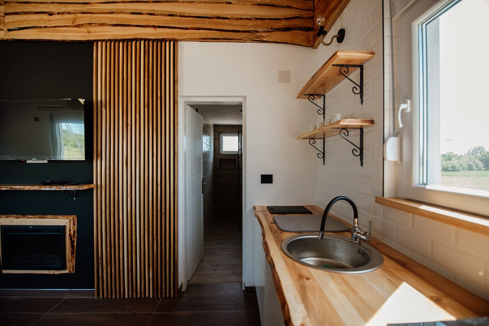 Kitchen with wood accents and open shelving (stock inspiration photo)